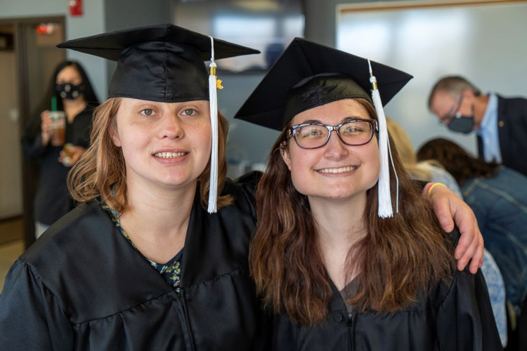 Two students that graduated AbleLight's college program
