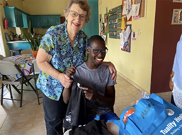 Terry and Moises delighted with their gifts