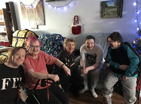 Group of friends celebrating Christmas together