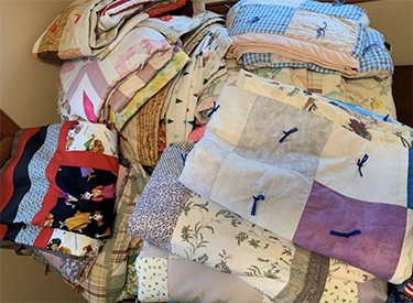 Quilts for group home residents in Oregon from Grace and Stella Lutheran Churches in Longview, WA