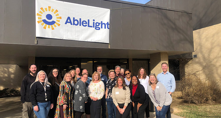 AbleLight Employees in front of Day Program Center in Fort Collins