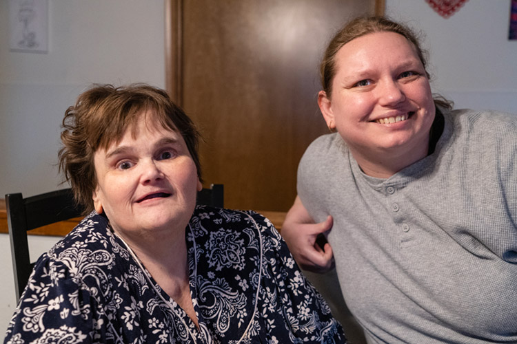 Katie and Kathy smiling in an AbleLight Congregate Living home