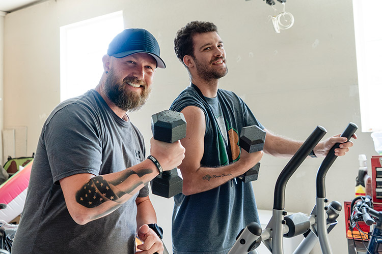 Johnathan and his Shared Living Provider, Cody, working out together