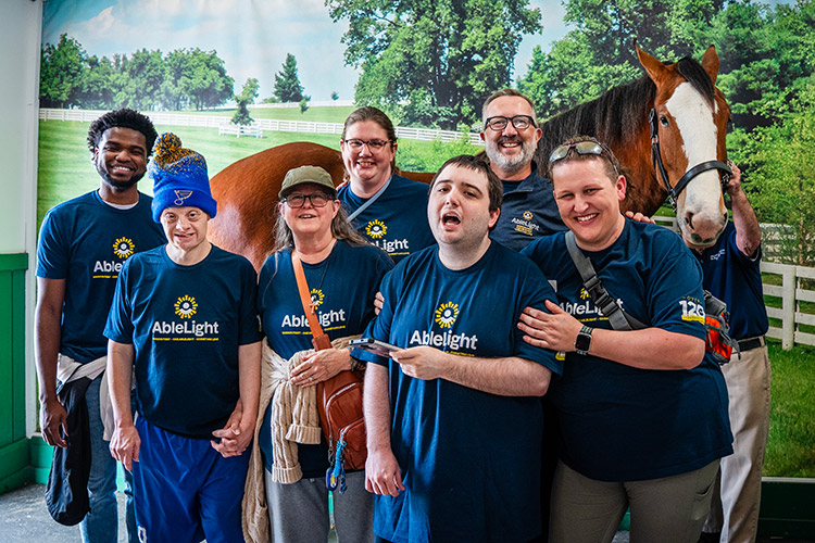 Group of AbleLight staff and people with developmental disabilities