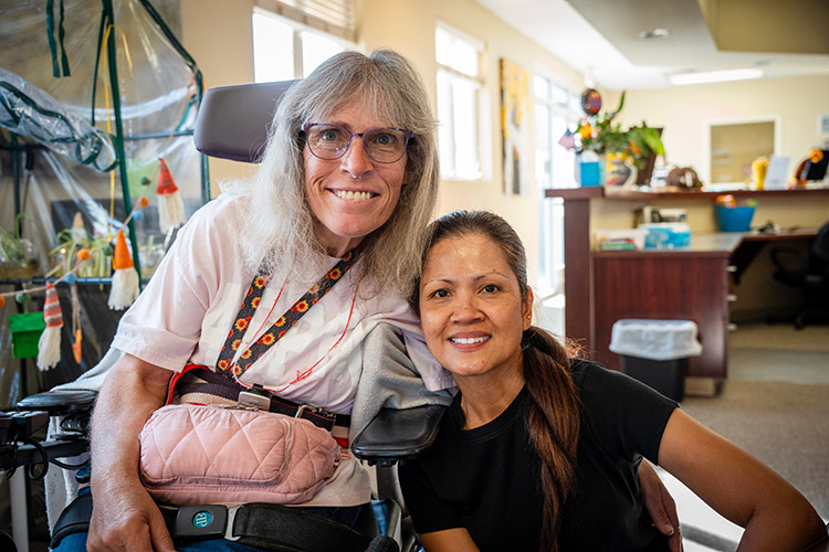 A woman and staff member at AbleLight's Day Program in Colorado Springs