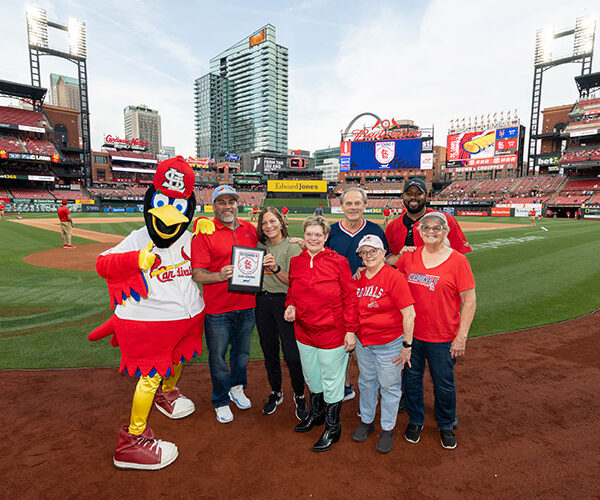 People supported by AbleLight with the ST. Louis Cardinals mascot