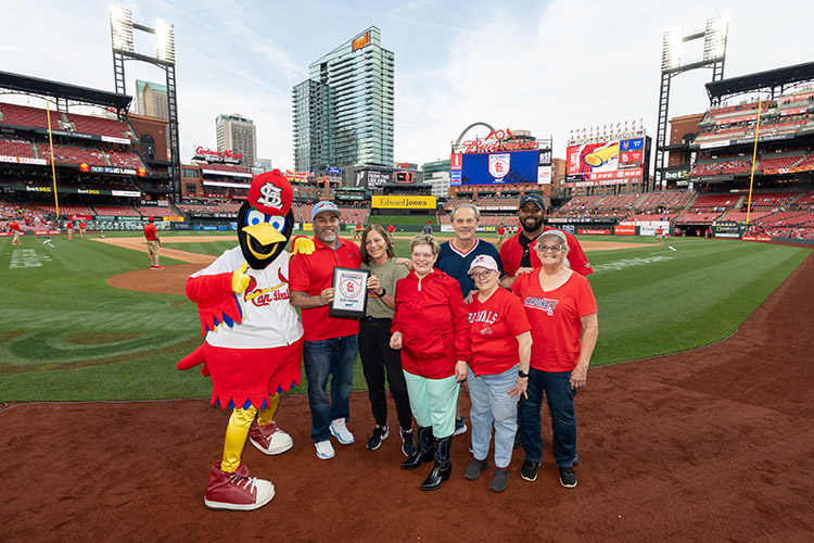 People supported by AbleLight with the ST. Louis Cardinals mascot